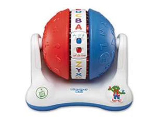Red and blue hemispherical educational toy with alphabet buttons on white base.