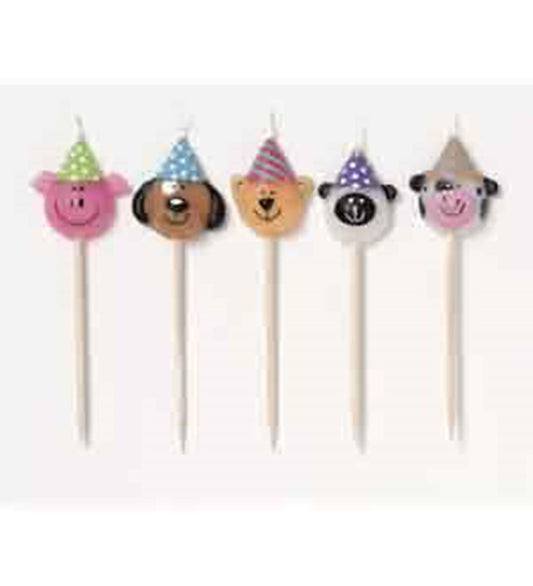 Set of five animal head birthday candles with colorful party hats on wooden sticks.