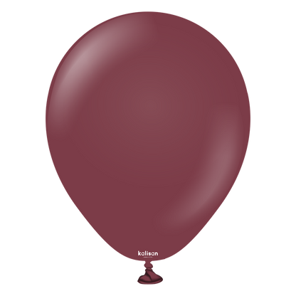Burgundy latex balloon, 5-inch, standard round shape, smooth surface, tied end.