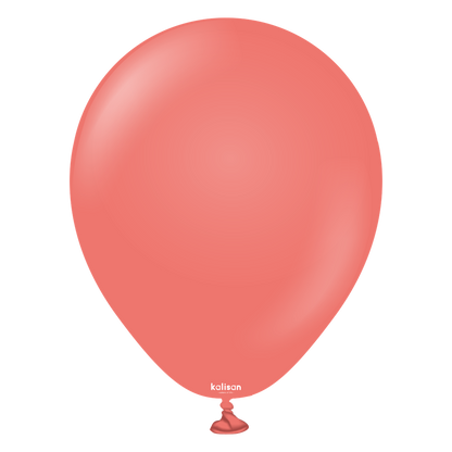 Coral pink latex balloon inflated, smooth surface, standard round shape, 5 inch size.