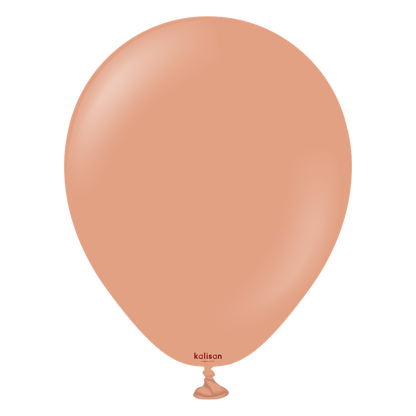 Pink latex balloon with a smooth, rounded shape and a tied neck.