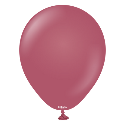 Matte dusty rose 5-inch latex balloon with small Kalisan logo near tied end.