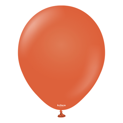 5-inch rust orange latex balloon with smooth surface and tied neck.