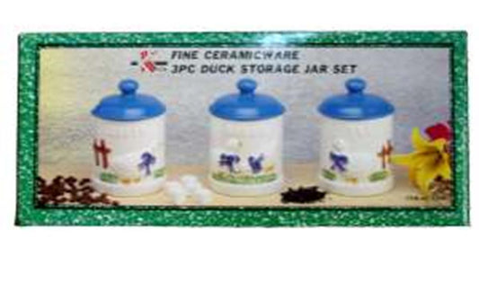 Three white ceramic storage jars with blue lids, each decorated with small duck illustrations and red bows.