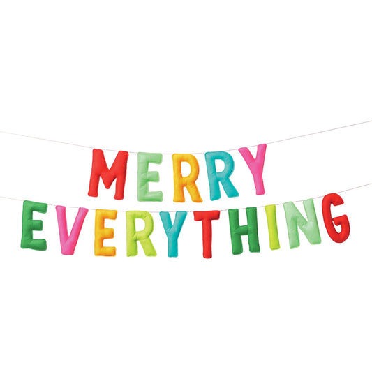 Colorful felt letter banner spelling "Merry Everything" with each letter in a different bright color on white string.