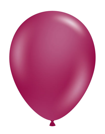 Glossy burgundy latex balloon inflated to show smooth texture and teardrop shape.