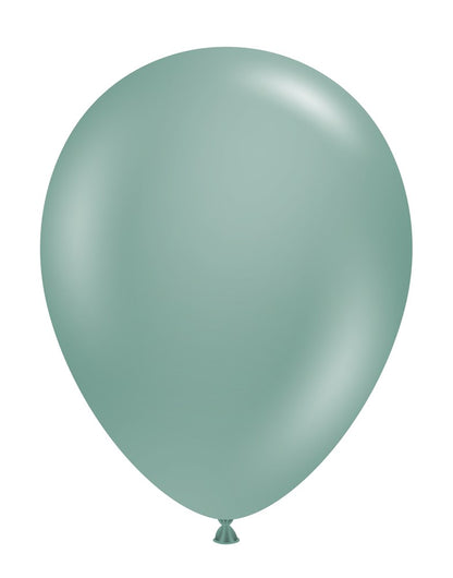Single green latex balloon with a smooth matte finish, rounded shape, and tied end.