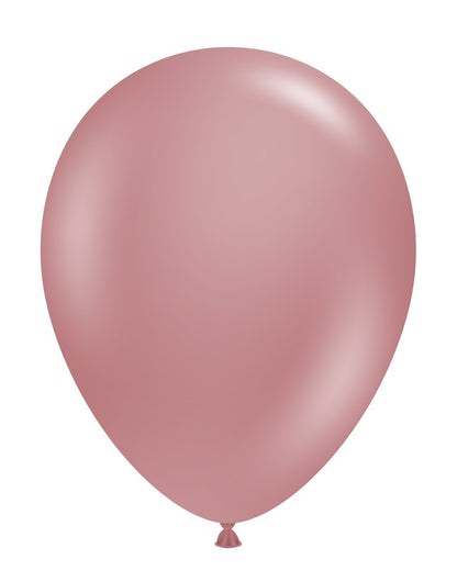 Single dusty rose-colored latex balloon with a smooth, glossy finish and standard oval shape.