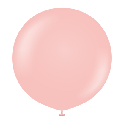 Round baby pink latex balloon inflated to full size with tied end visible.