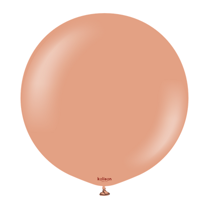 36-inch round clay pink latex balloon with glossy finish and small tied neck.