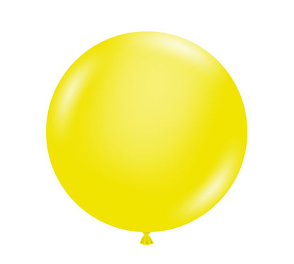 Clear yellow 17-inch round latex balloon with a smooth, shiny surface and tied end.