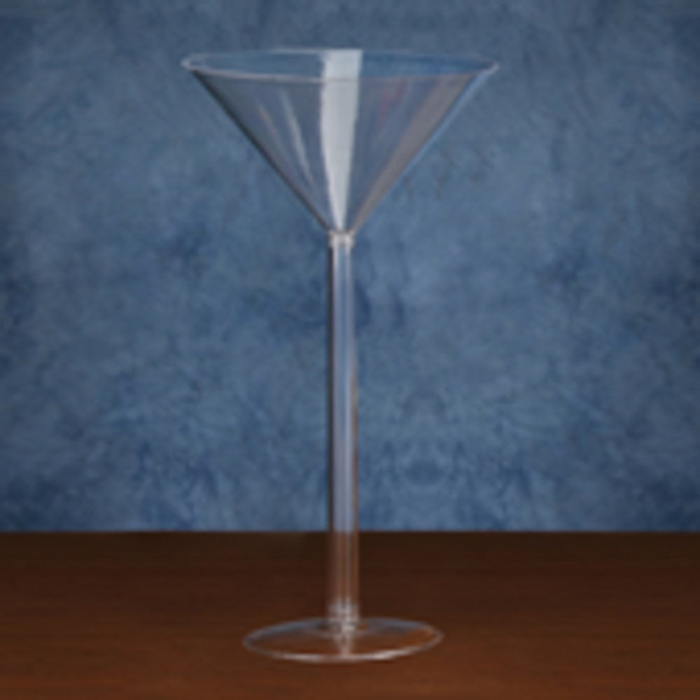 Clear plastic martini glass with a tall, slender stem and wide, conical bowl on a flat base.