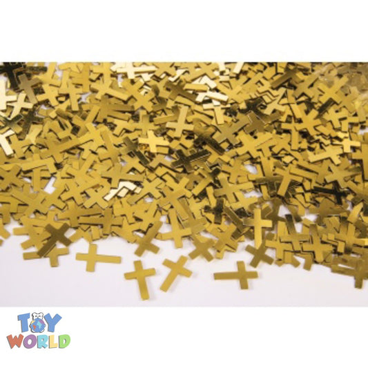Small metallic gold cross-shaped confetti scattered on a white surface.