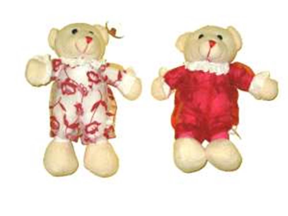 Two small beige plush bears wearing red patterned outfits, one with hearts and the other solid red, both with stitched.