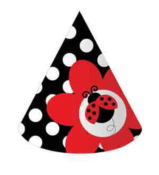 Child-size cone party hat with black and white polka dots, large red flower accent, and smiling ladybug illustration.