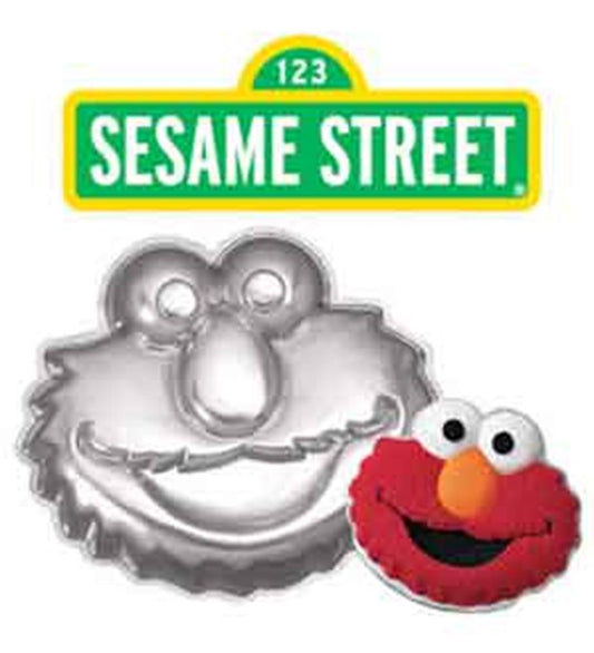 Silver metal cake pan shaped like Elmo's face with detailed features and rounded edges.