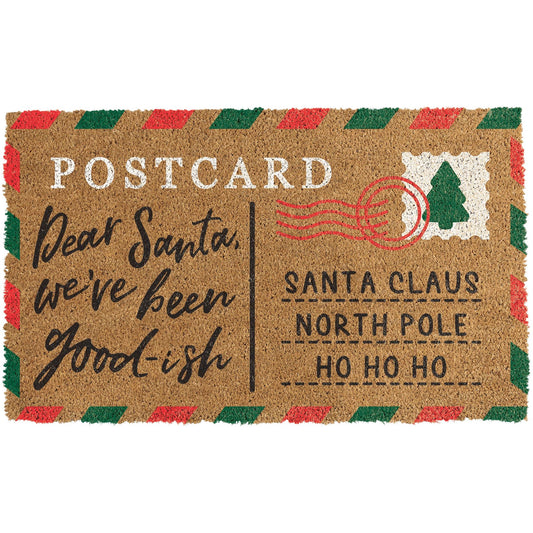 Rectangular coir doormat with red and green striped border, printed postcard design, and festive text to Santa Claus.