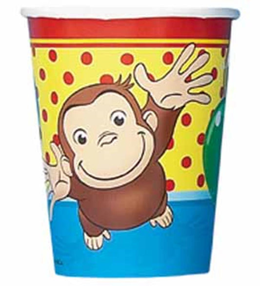 Yellow and red plastic cup featuring Curious George cartoon with red polka dots and blue base.