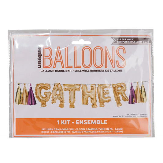 Gold foil mini letter balloons spelling "GATHER" with attached purple and gold tassels in clear packaging.