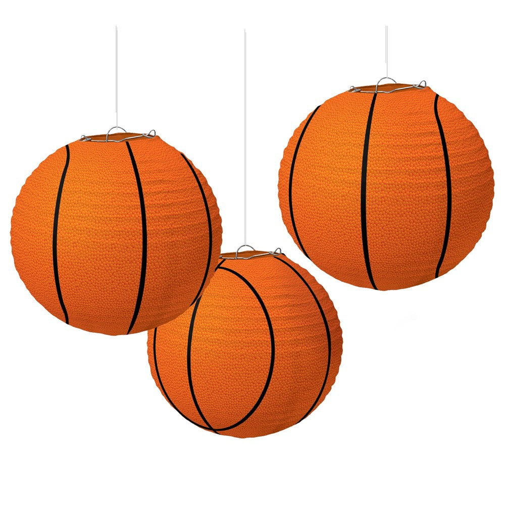 Set of three orange paper lanterns designed to look like basketballs with black panel lines.