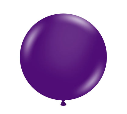 Large round latex balloon in solid crystal purple with a smooth, glossy finish.