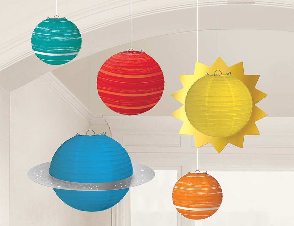 Colorful hanging paper lanterns shaped like planets and a yellow sun, in teal, red, blue, orange, and yellow designs.