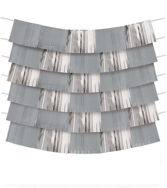 Shiny silver foil backdrop with horizontal strips creating a shimmering curtain effect.