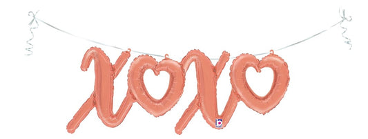 34-inch coral pink foil balloon spelling "XOXO" with heart shapes, inflated and hung with attached strings.