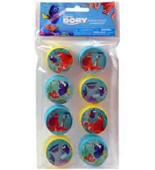 Eight round plastic pencil sharpeners in assorted colors with Finding Dory character designs, packaged in clear plastic.