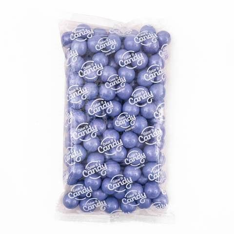 Clear bag filled with shiny lavender-colored round gumballs labeled Candy Crafty.