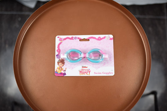 Pink and purple kids swim goggles with blue lenses, packaged on a Fancy Nancy themed card.