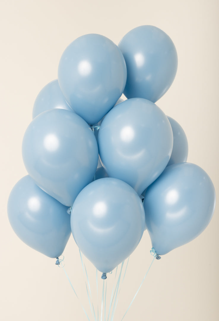 Cluster of light blue, helium-filled 11-inch latex balloons with a smooth, shiny surface.