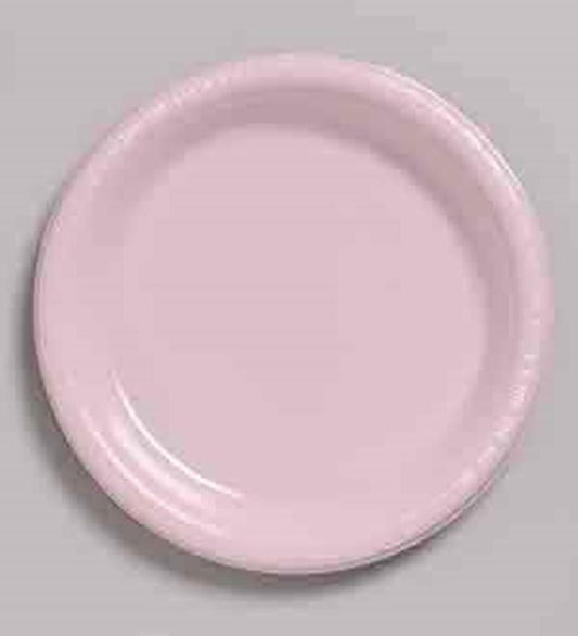 Round 7-inch smooth pink ceramic plate with slightly raised rim.