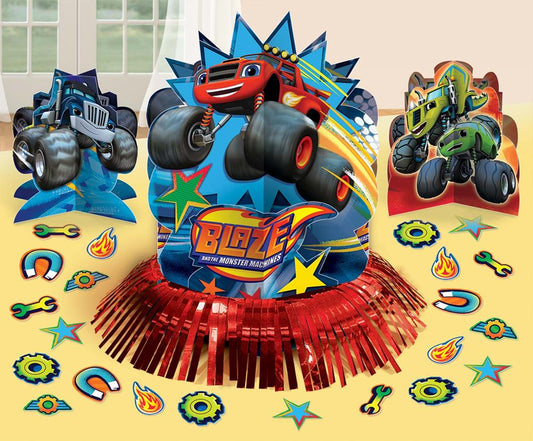 Blaze Monster Machines centerpiece with colorful monster trucks, stars, and flames on red fringe base.