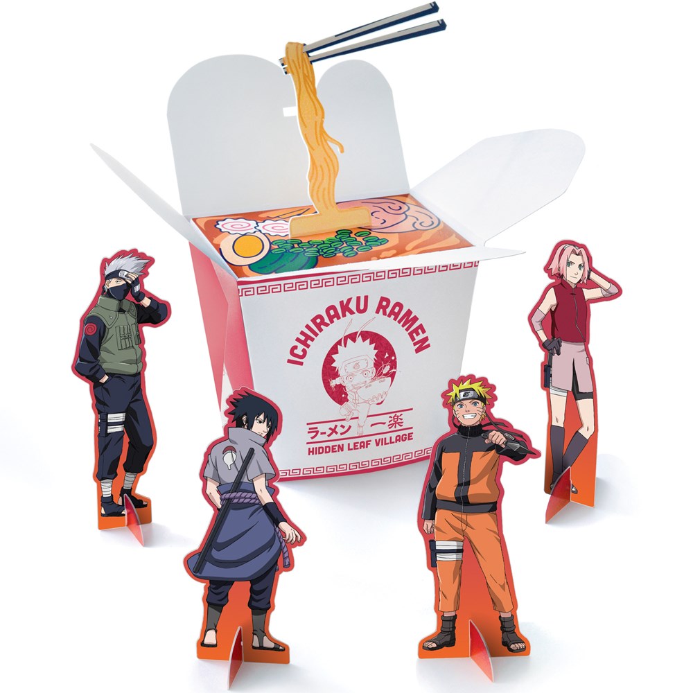 Naruto table centerpiece featuring four colorful character standees around a red and white Ichiraku Ramen takeout box with.