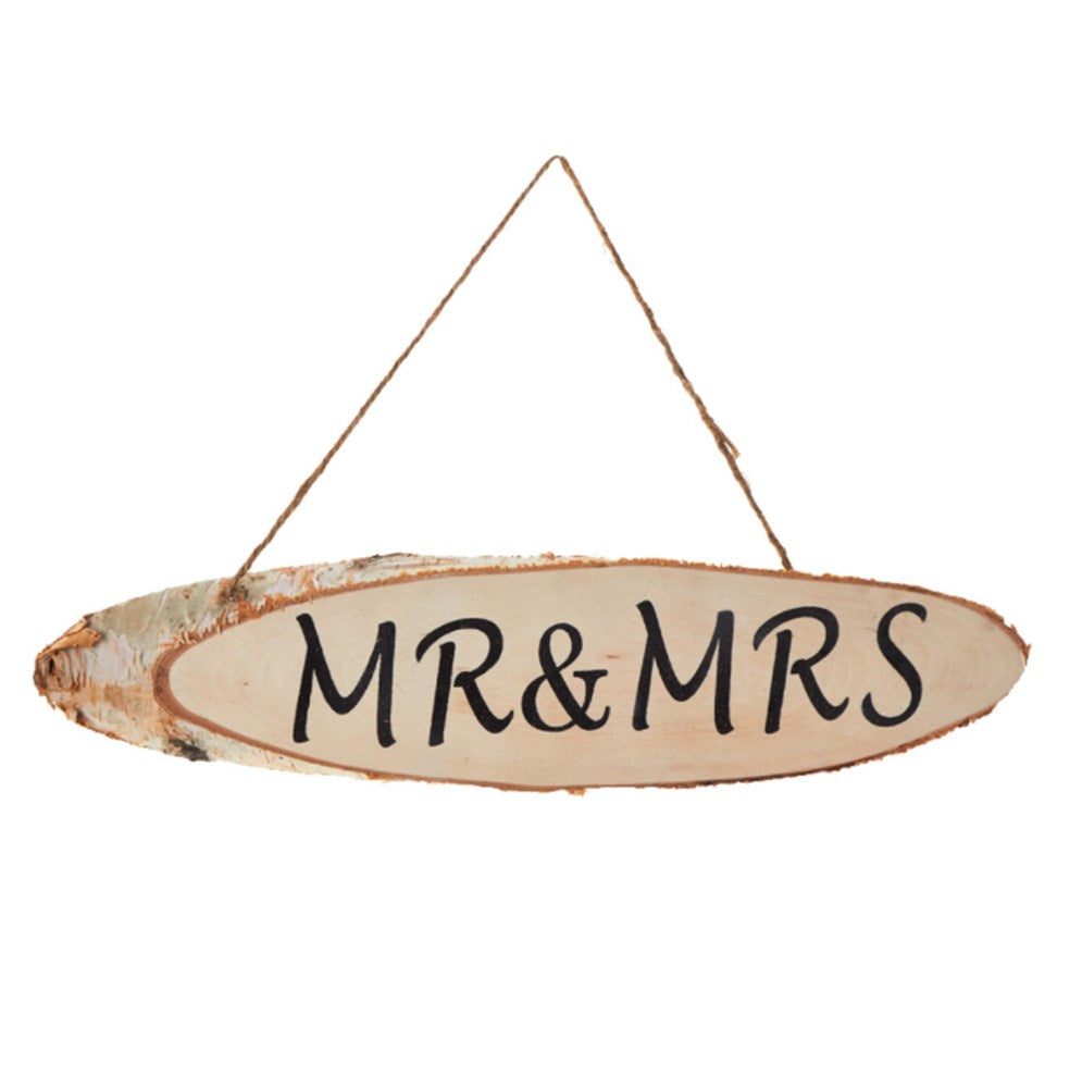 Oval wooden sign with natural bark edges, painted beige center, black "MR & MRS" text, hanging by twine rope.
