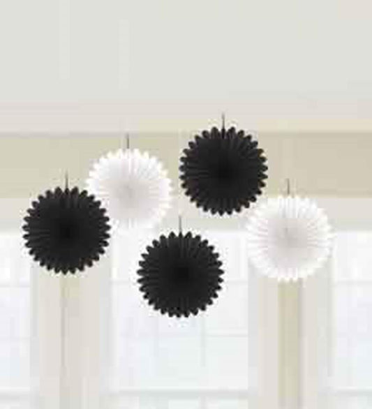 Black and white 6-inch mini fans with scalloped edges hanging in a decorative arrangement.