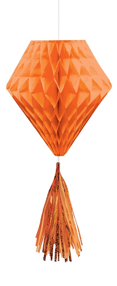 Orange peel-colored tissue paper tassel ball with honeycomb texture and hanging tassels.