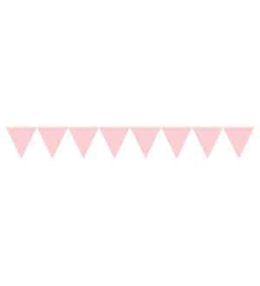 Pink paper triangular flag banner with white polka dots, strung on a white string.