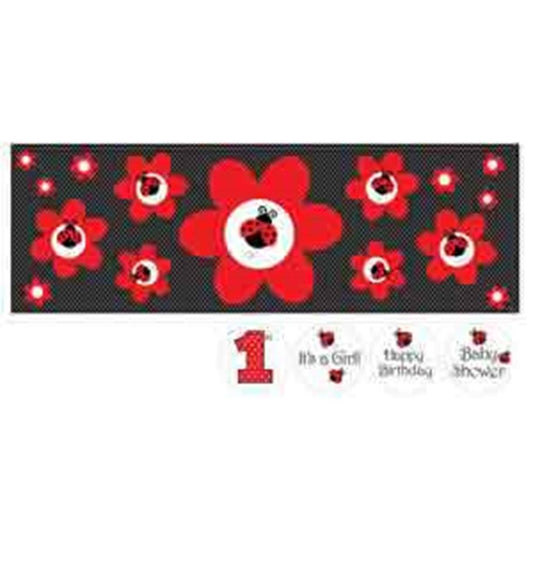 Black party banner with large red flowers featuring white centers and ladybug graphics, designed for girls' birthday.