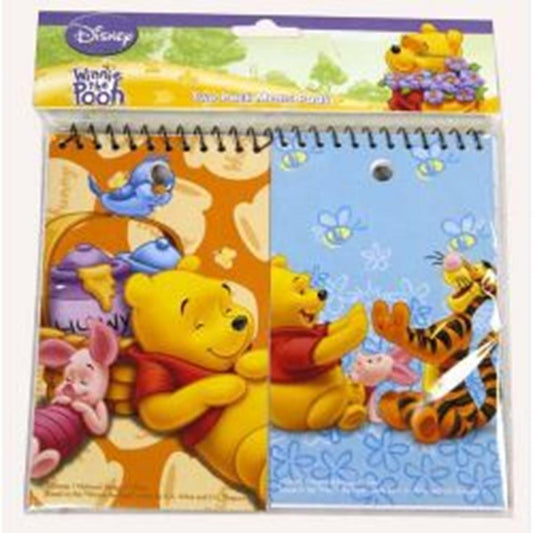 Two 3x5 spiral memo pads featuring Winnie the Pooh characters, one orange with Pooh and Piglet, the other blue with Pooh,.