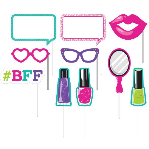 Colorful photo booth props including glittery speech bubbles, pink lips, heart and cat-eye glasses, nail polish bottles, a.