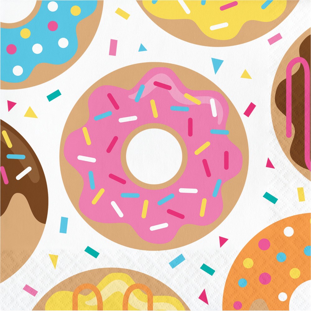 Colorful donut-patterned napkin with pink, yellow, chocolate, and blue frosted donuts and sprinkles on white background.