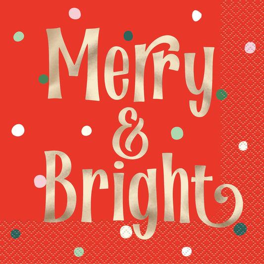 Red vintage-style Christmas napkin with gold "Merry & Bright" text and colorful confetti dots.
