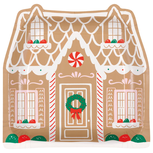 Set of eight 8.25-inch disposable plates shaped like gingerbread houses with white icing patterns, red and green candy.