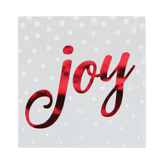 Gray beverage napkin with white polka dots and shiny red script "joy" text.