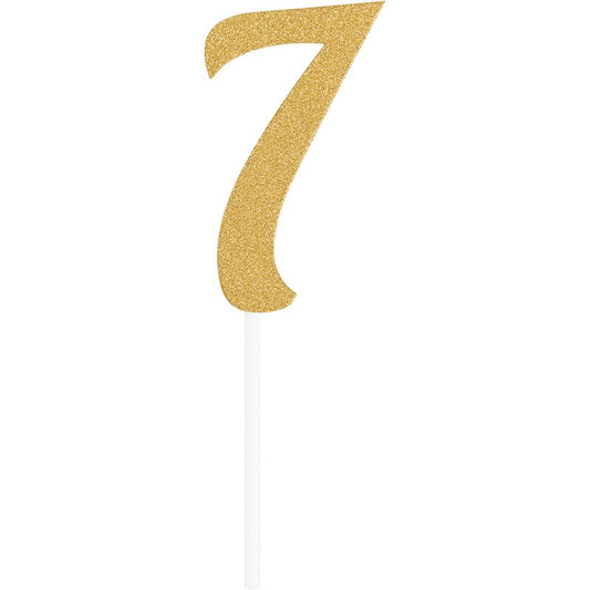 Gold glitter number 7 cake topper with slender white stick handle.