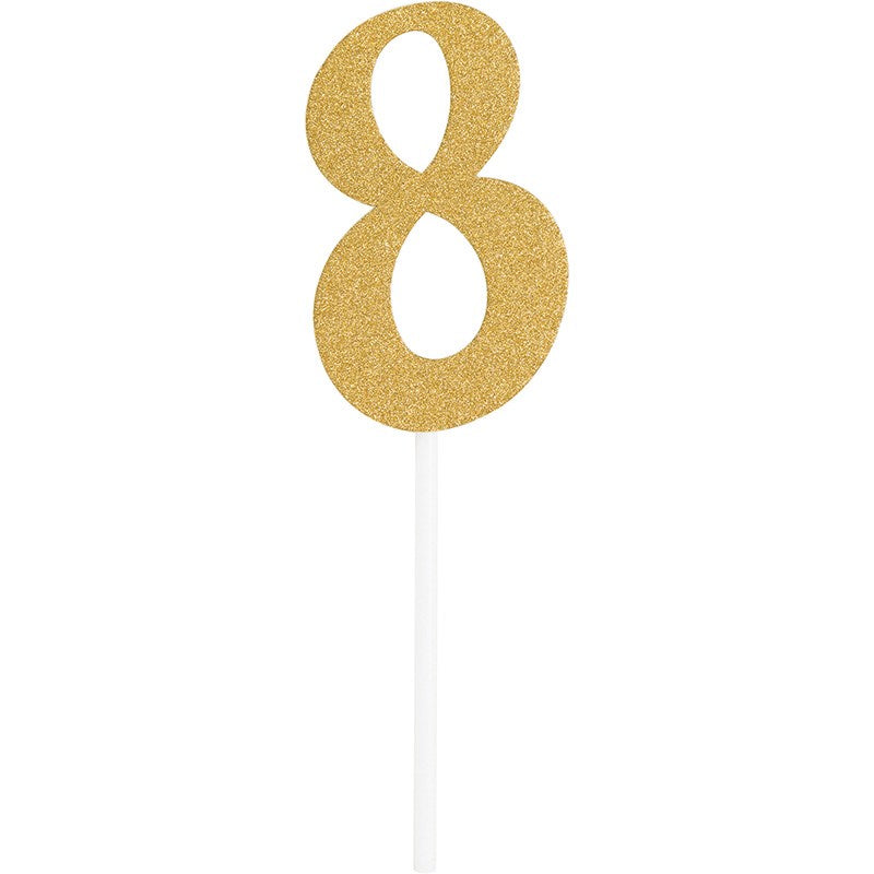 Gold glitter number 8 cake topper with white stick holder.