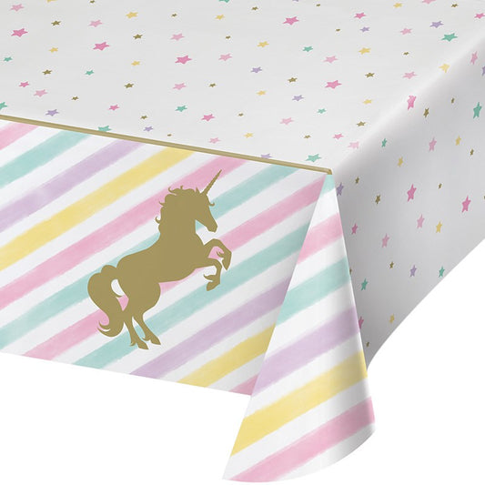 Rectangular plastic tablecover with pastel diagonal stripes and gold unicorn silhouette on corner, white background with.
