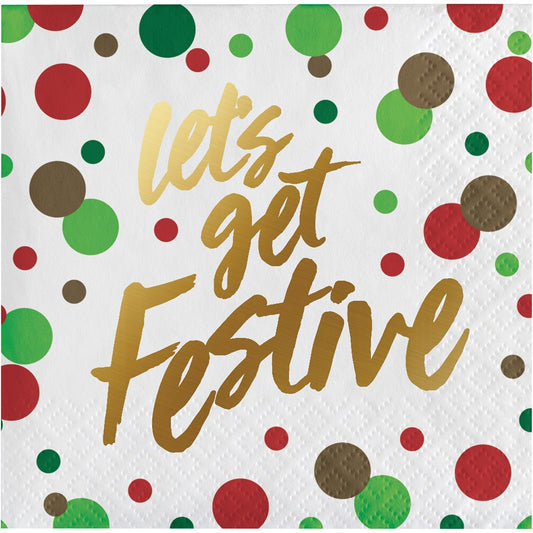 White beverage napkin with gold script "let's get Festive" surrounded by red, green, and brown confetti dots.